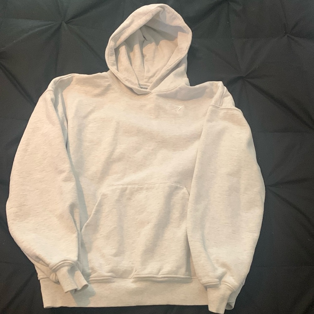 Gymshark hoodie with front pocket in light grey size XS.
